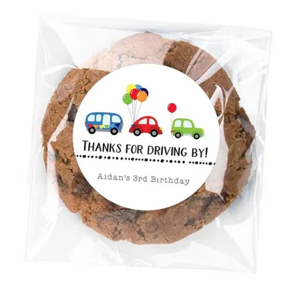 Cookie in sealed plastic with thank you note for attending birthday parade
