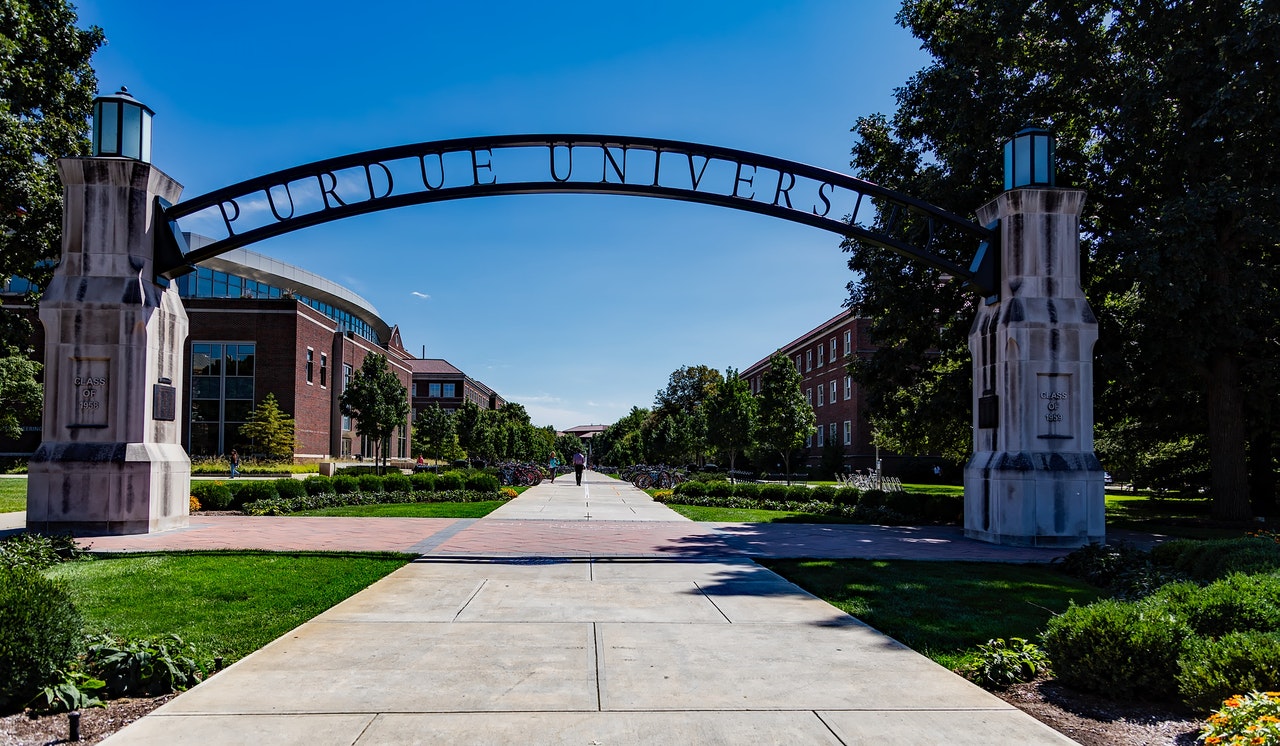 Wide stone and metal entrance arch of Purdue University in West Lafayette in Indiana