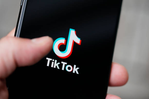 Tiktok Wallpaper logo on iphone